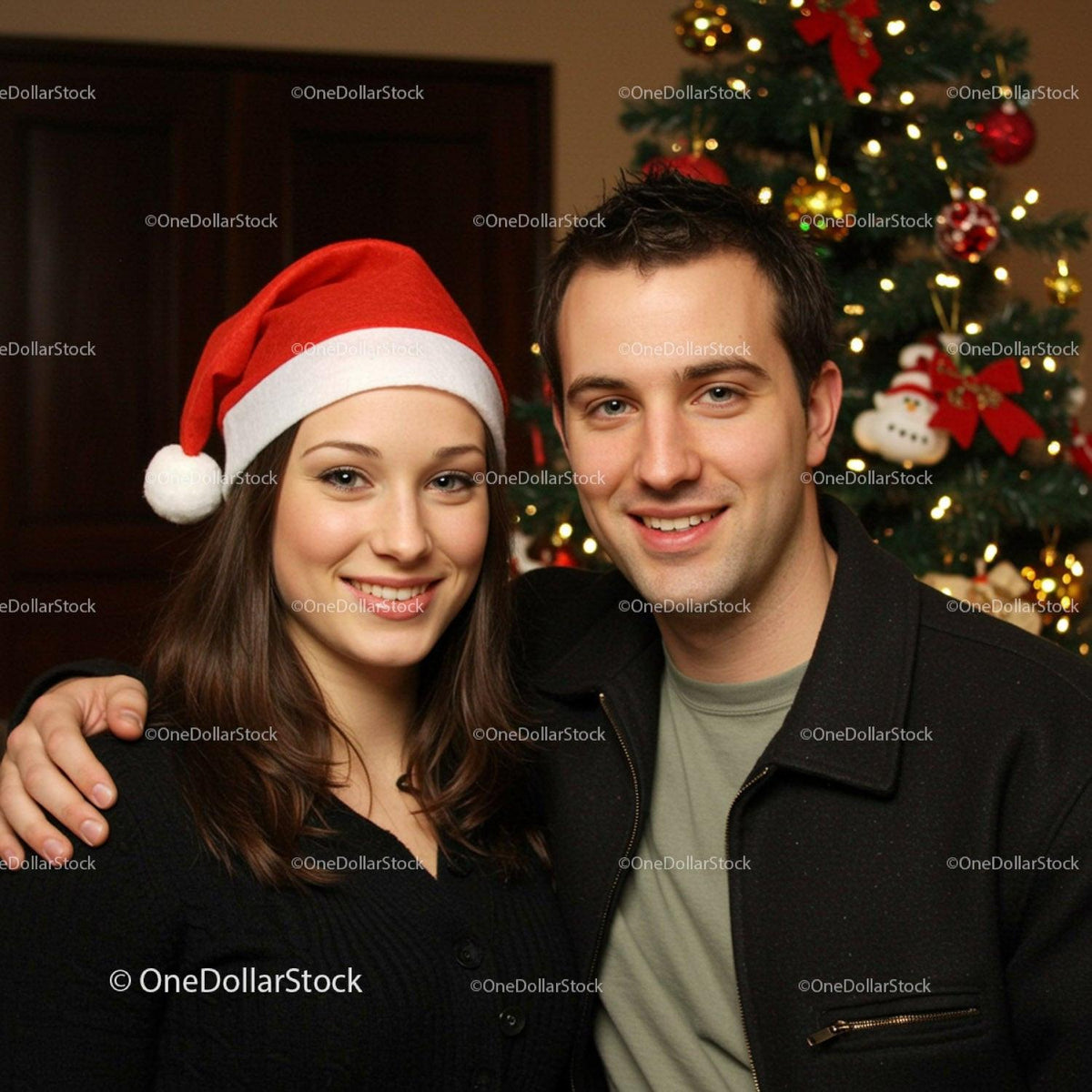 Couple Smiling by Christmas Tree in Festive Setting