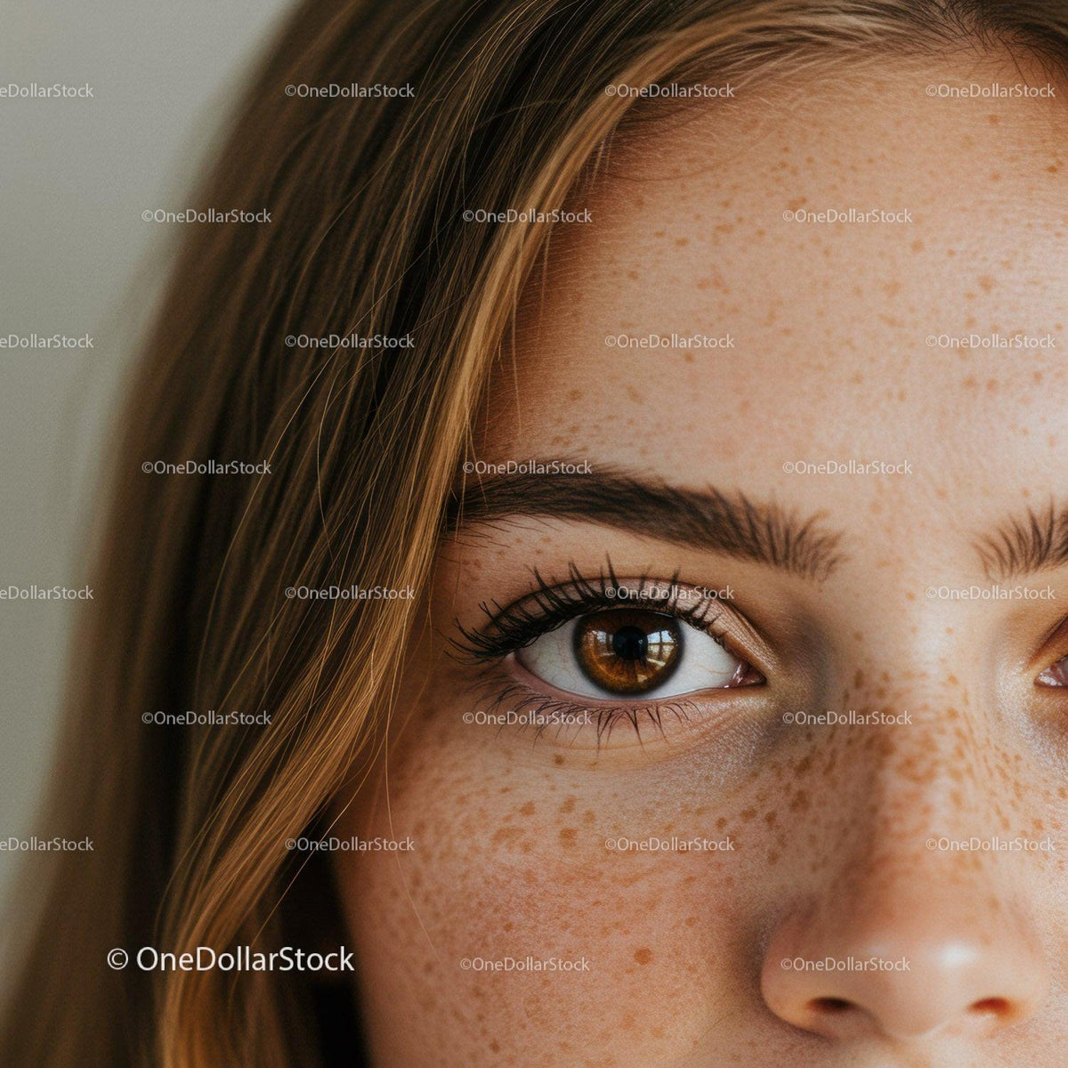 Close-up Portrait of a Woman with Brown Eyes and Freckles