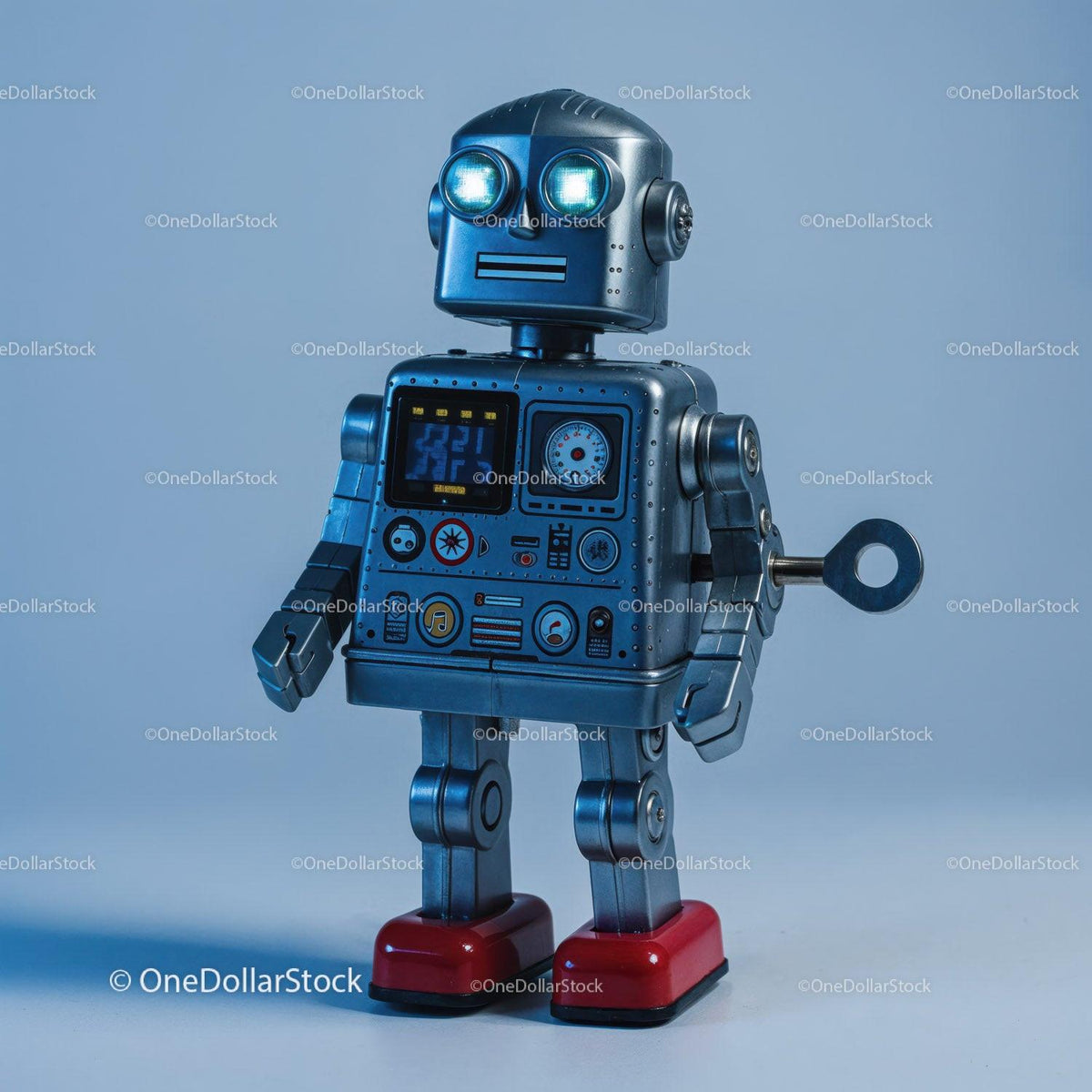 Blue metal robot toy with glowing blue eyes and wind-up key standing on light blue surface