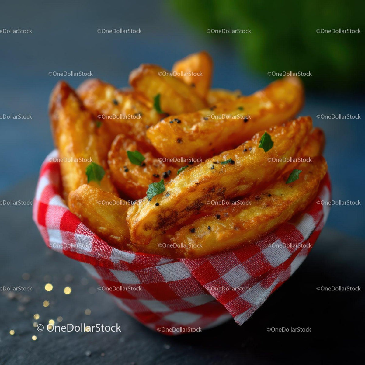 Golden Crispy Potato Wedges with Herb Garnish