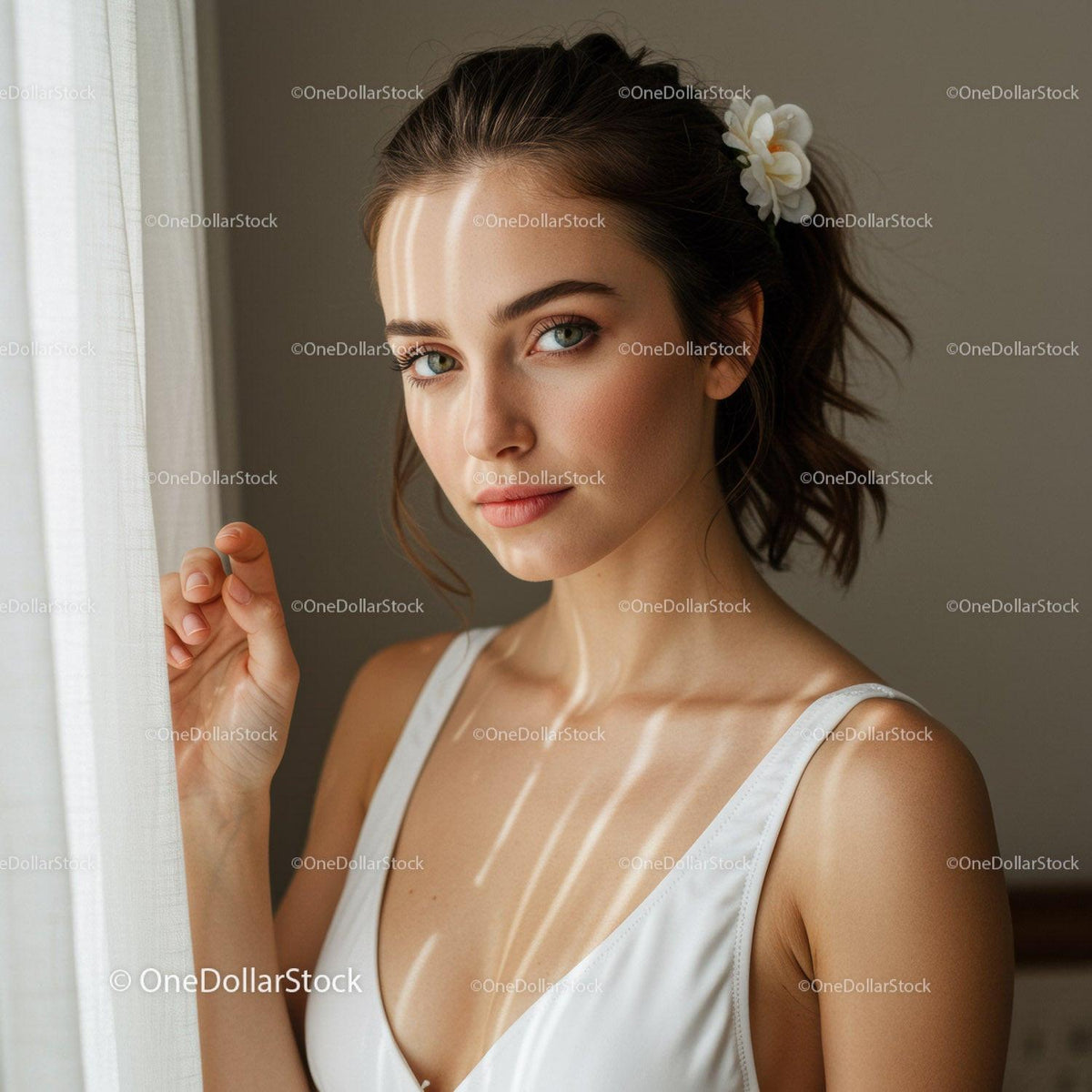 Elegant Portrait of a Young Woman with Flower Hair Accessory