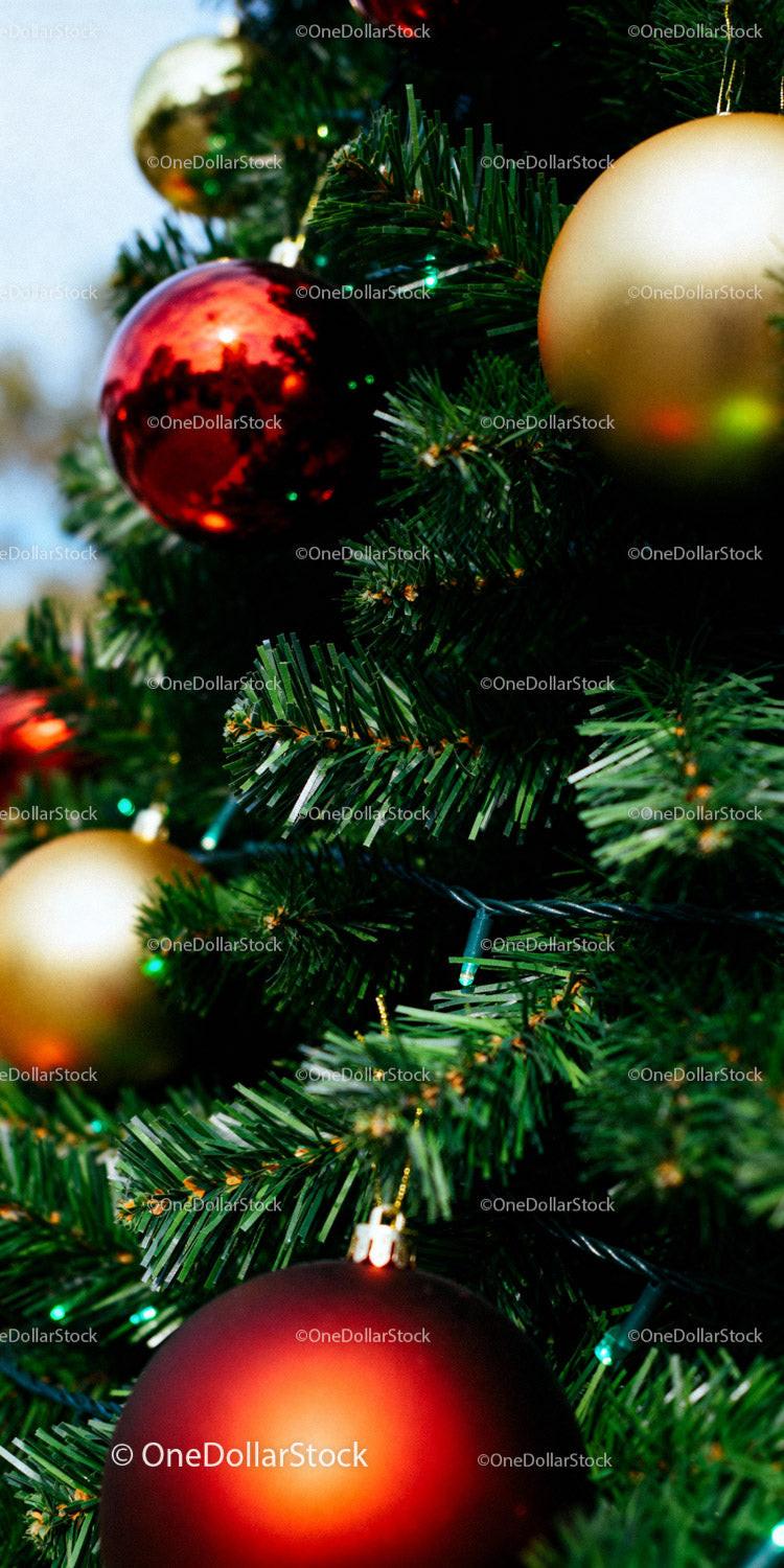 Festive Christmas tree decorated with vibrant baubles