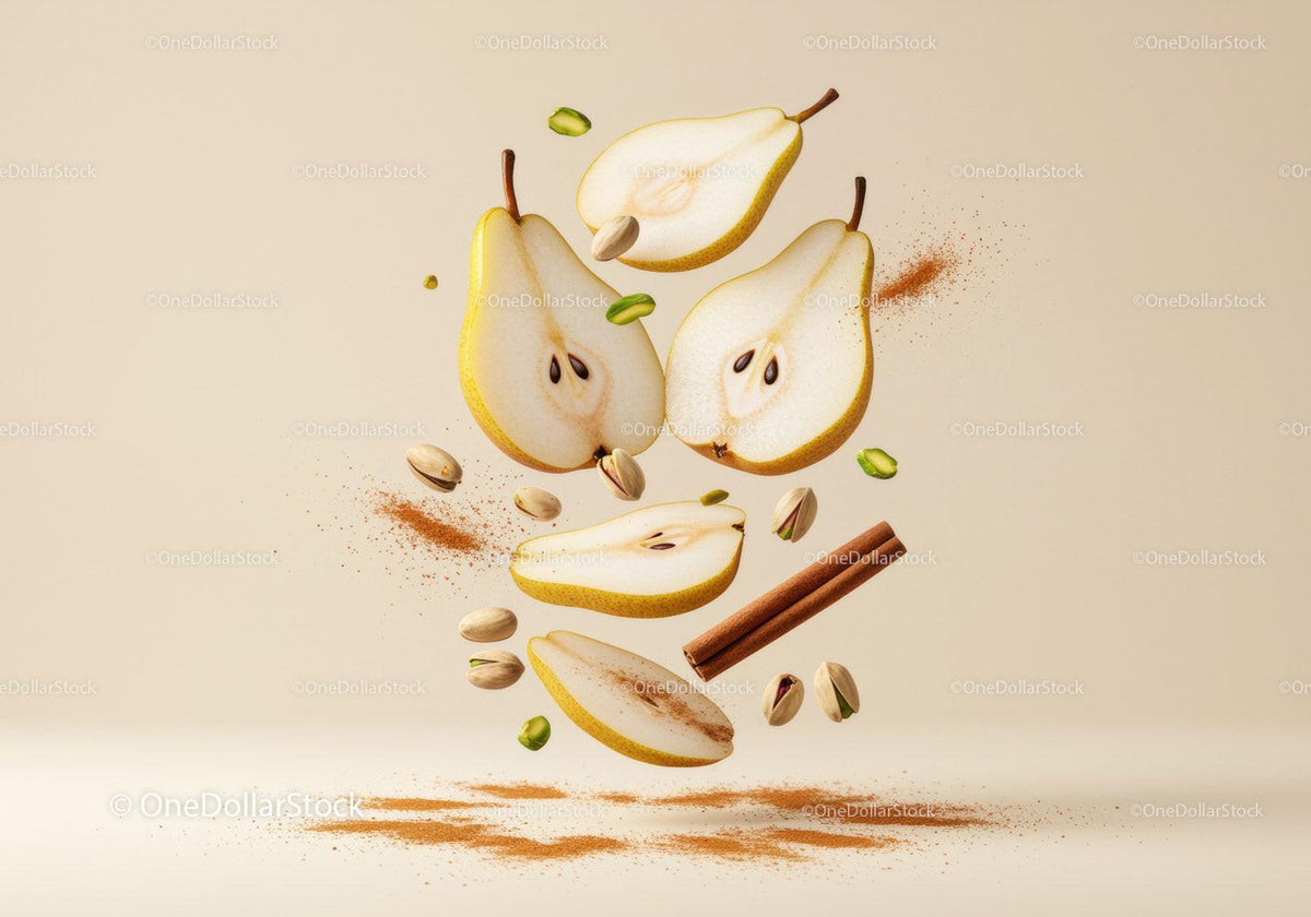Fresh pear slices with cinnamon and pistachios floating