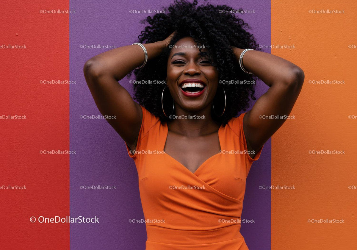 Joyful Woman with Afro Hair in Orange Dress Celebrating Against Colorful Background