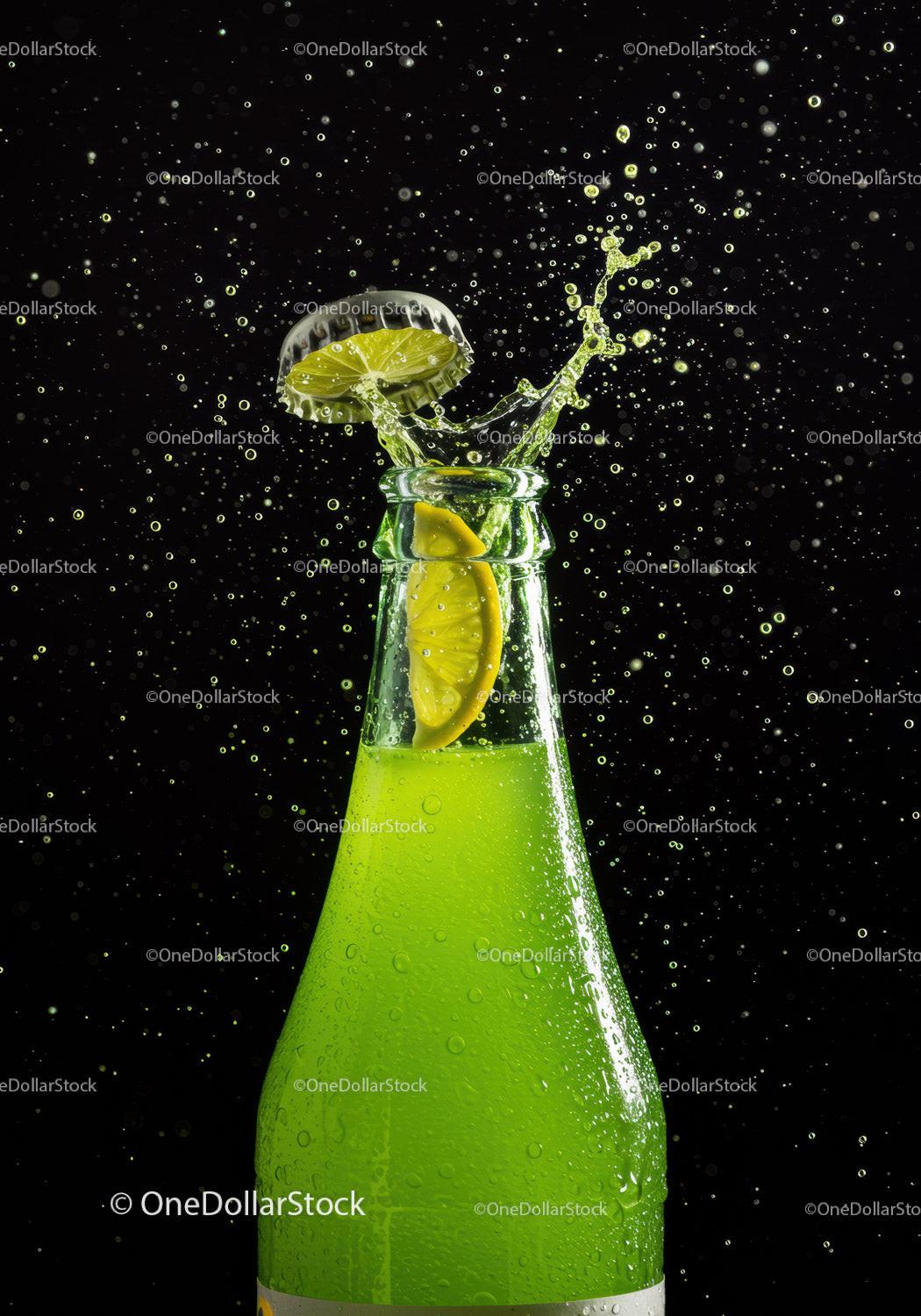 Refreshing lime soda bottle with splashing cap and lemon slice