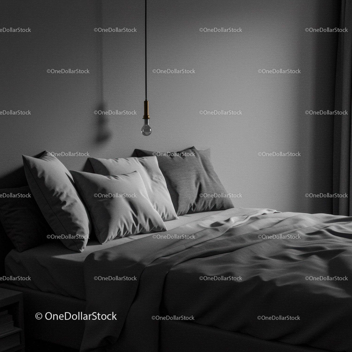 Modern bedroom with gray pillows and minimalist decor