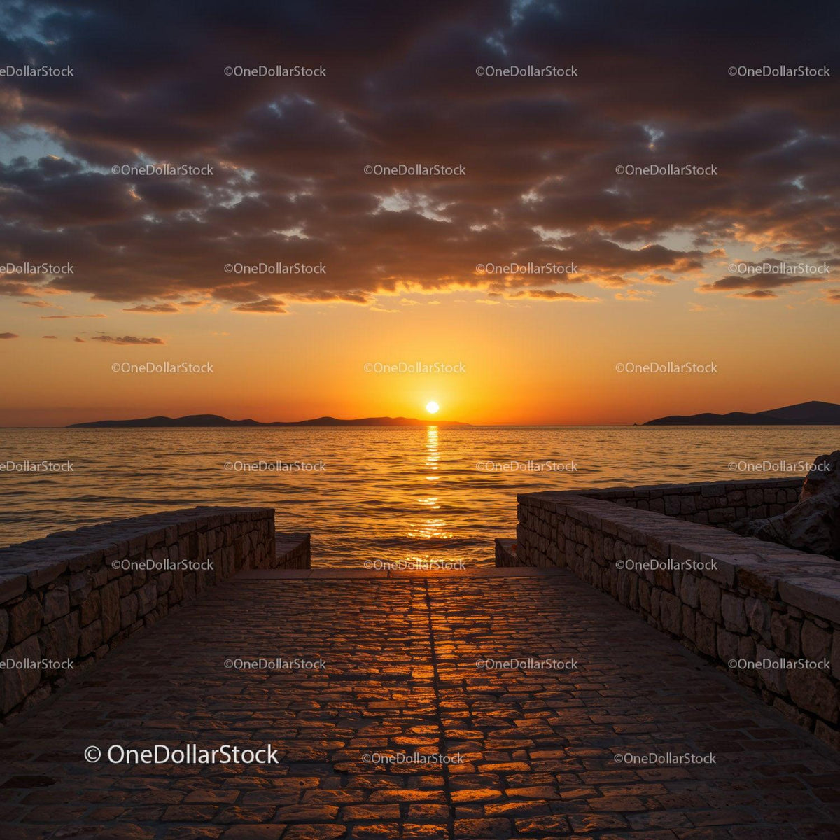 Serene Ocean Sunset with Cloudy Sky and Stone Pier