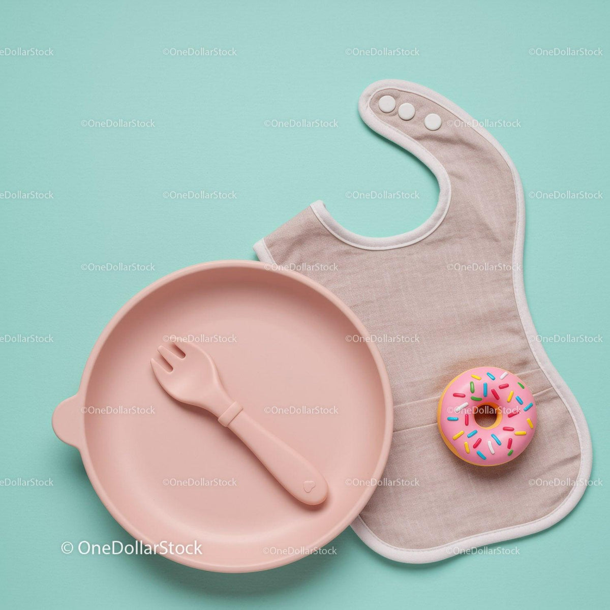 Minimalist baby dining set with bib and toy donut