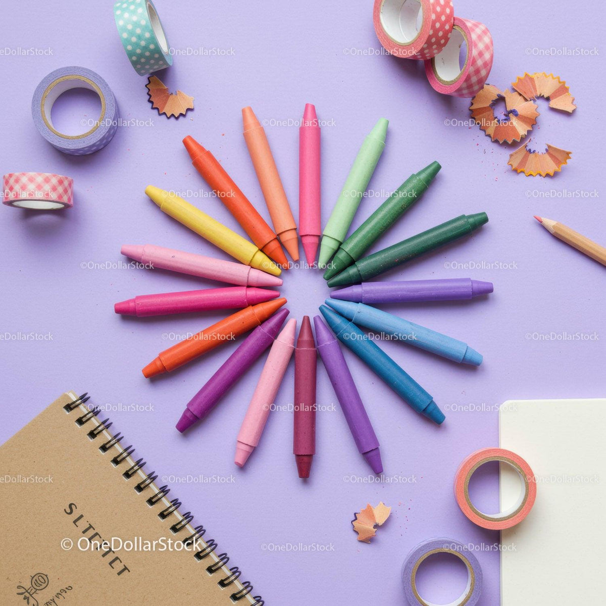 Colorful crayons arranged in a creative circle on desk