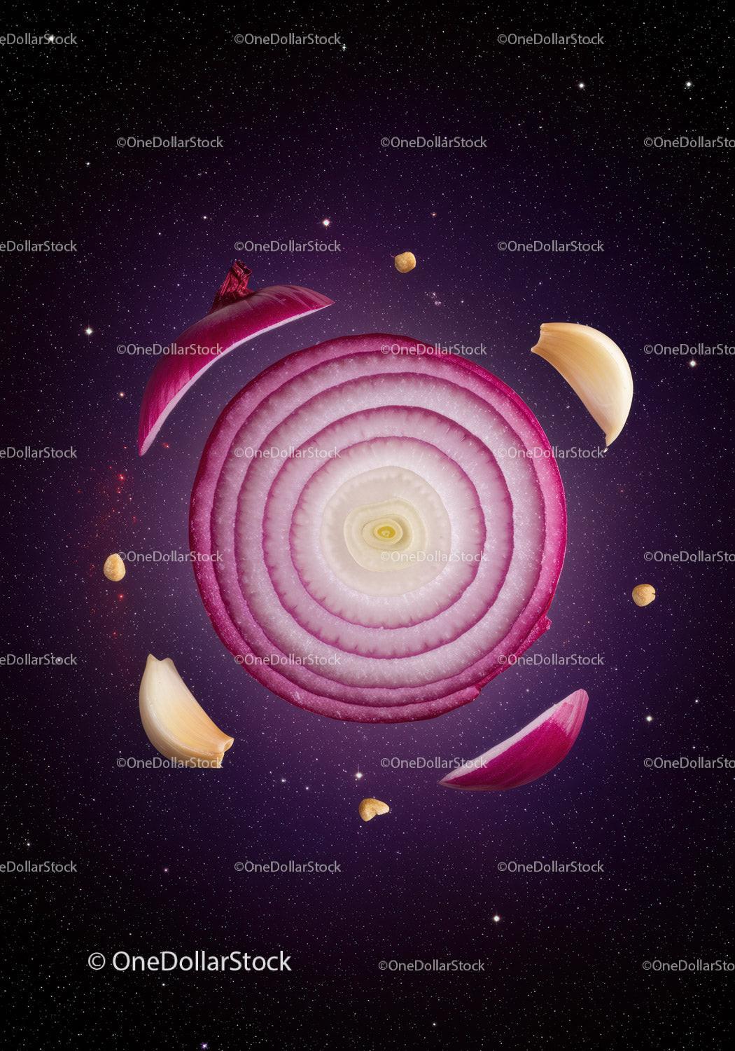 Sliced Red Onion and Garlic Floating in Space