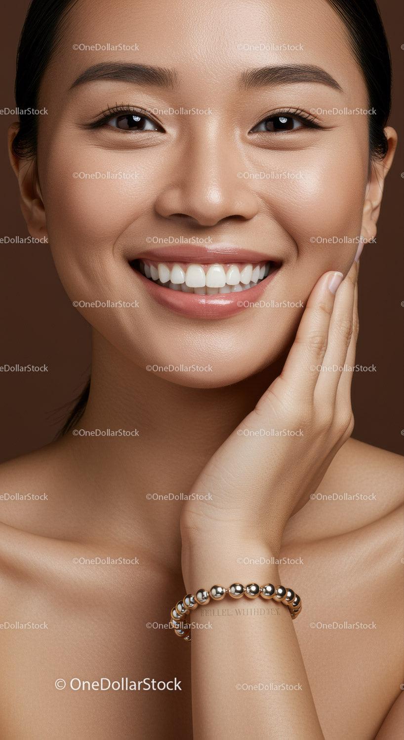 Close up portrait of smiling woman with smooth skin