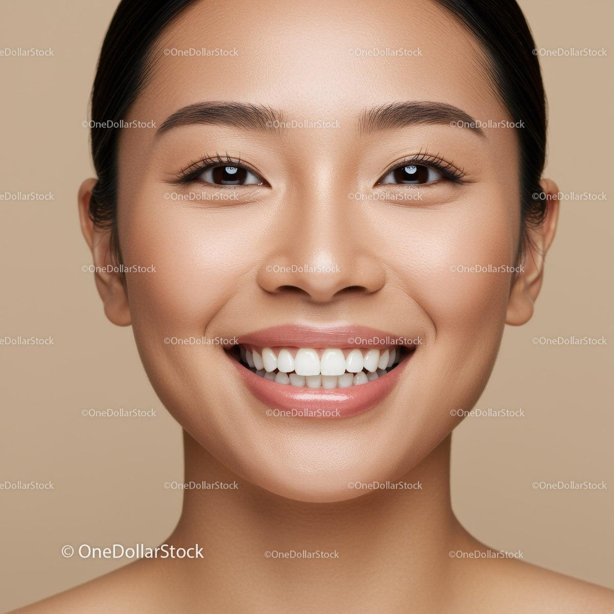 Closeup of happy woman with flawless skin and bright smile