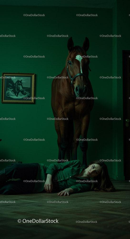 Woman Lying on Floor Beside a Horse in Dramatic Green Room Stock Photo Bundle preview 11