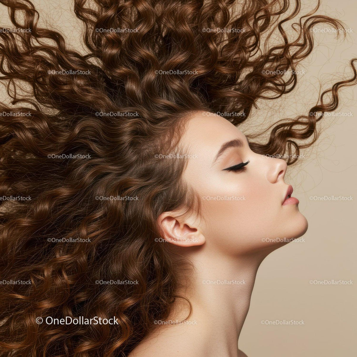 Profile of serene woman with voluminous curly hair