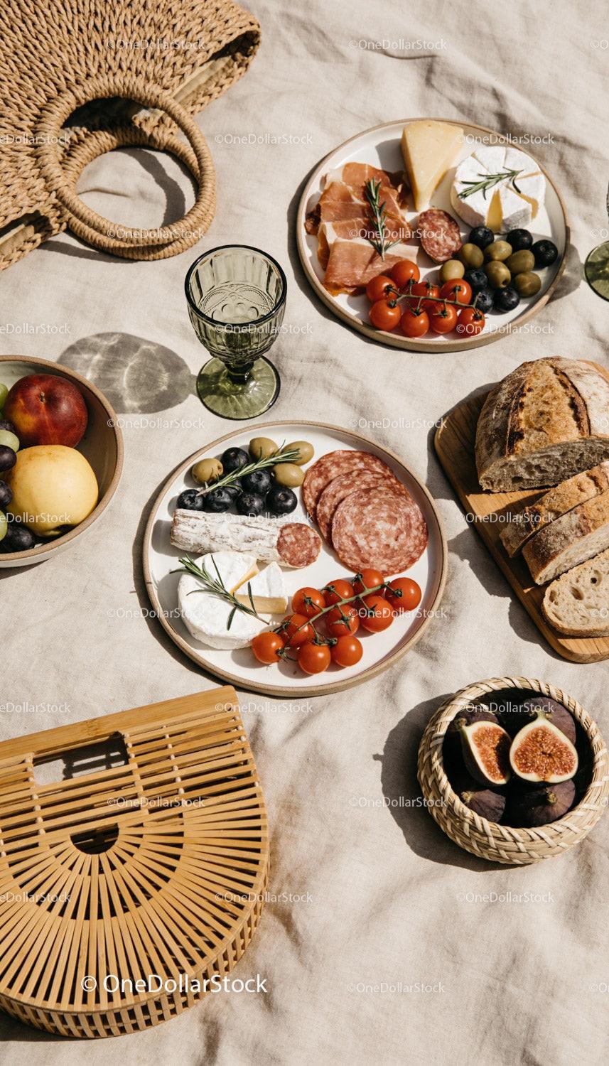 Elegant Outdoor Picnic with Cheese and Fresh Bread