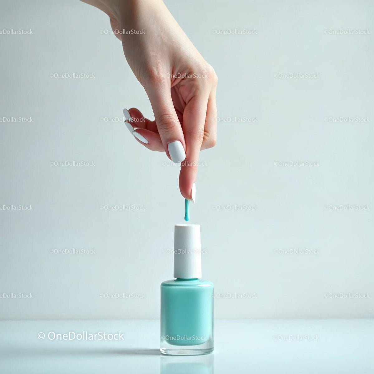 Woman Applying Pastel Blue Nail Polish with Brush JPG Mockup Image preview