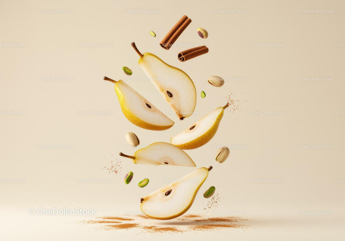 Fresh pear slices with cinnamon and pistachios floating