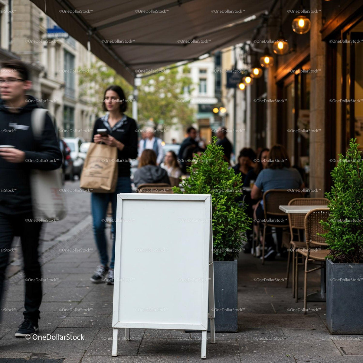 Blank white signboard on busy city cafe sidewalk JPG Mockup Image preview