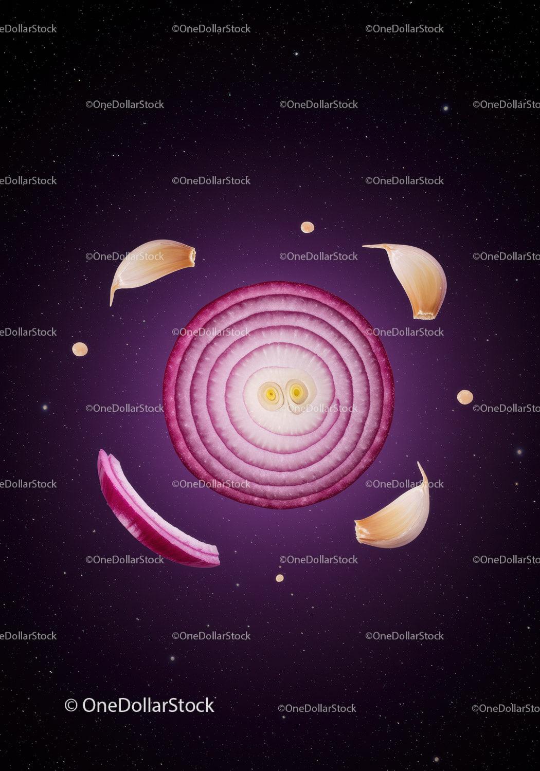 Sliced Red Onion and Garlic Cloves on Dark Background
