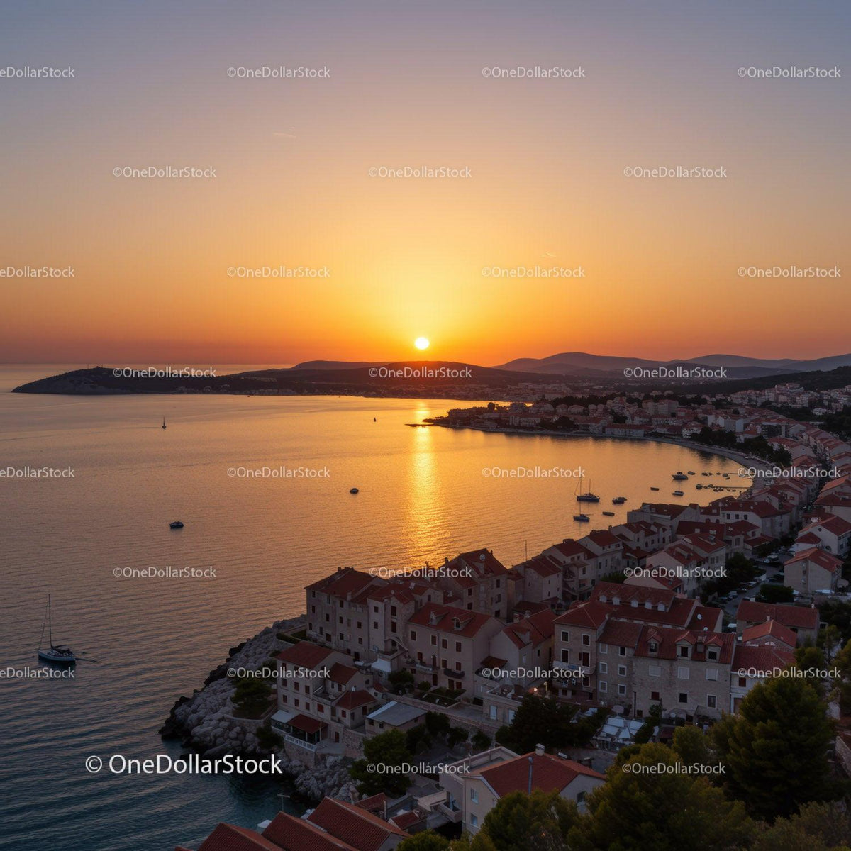 Beautiful Sunset Over Coastal Village With Red Roofs and Sailing Boats