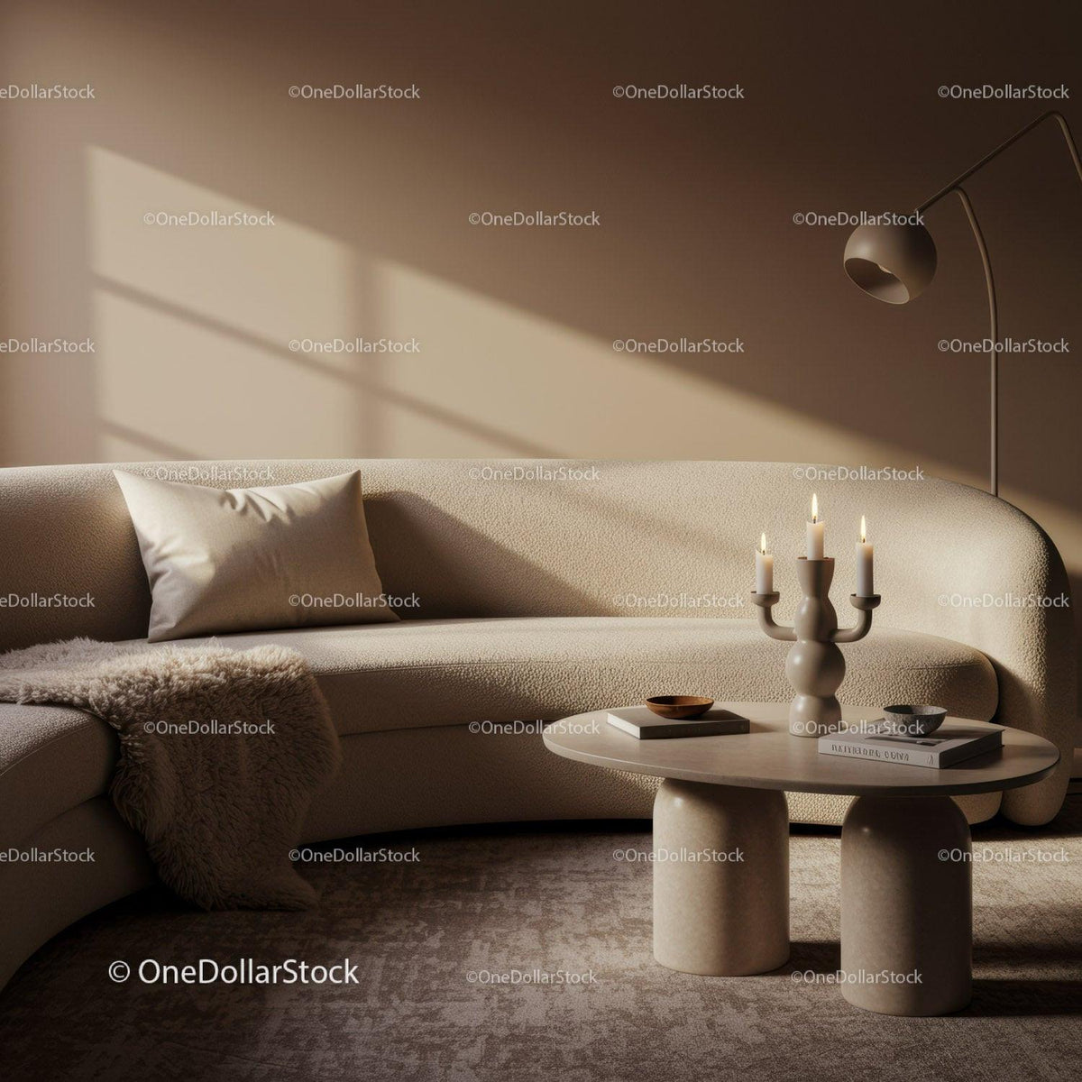 Cozy neutral living room with curved sofa and candles