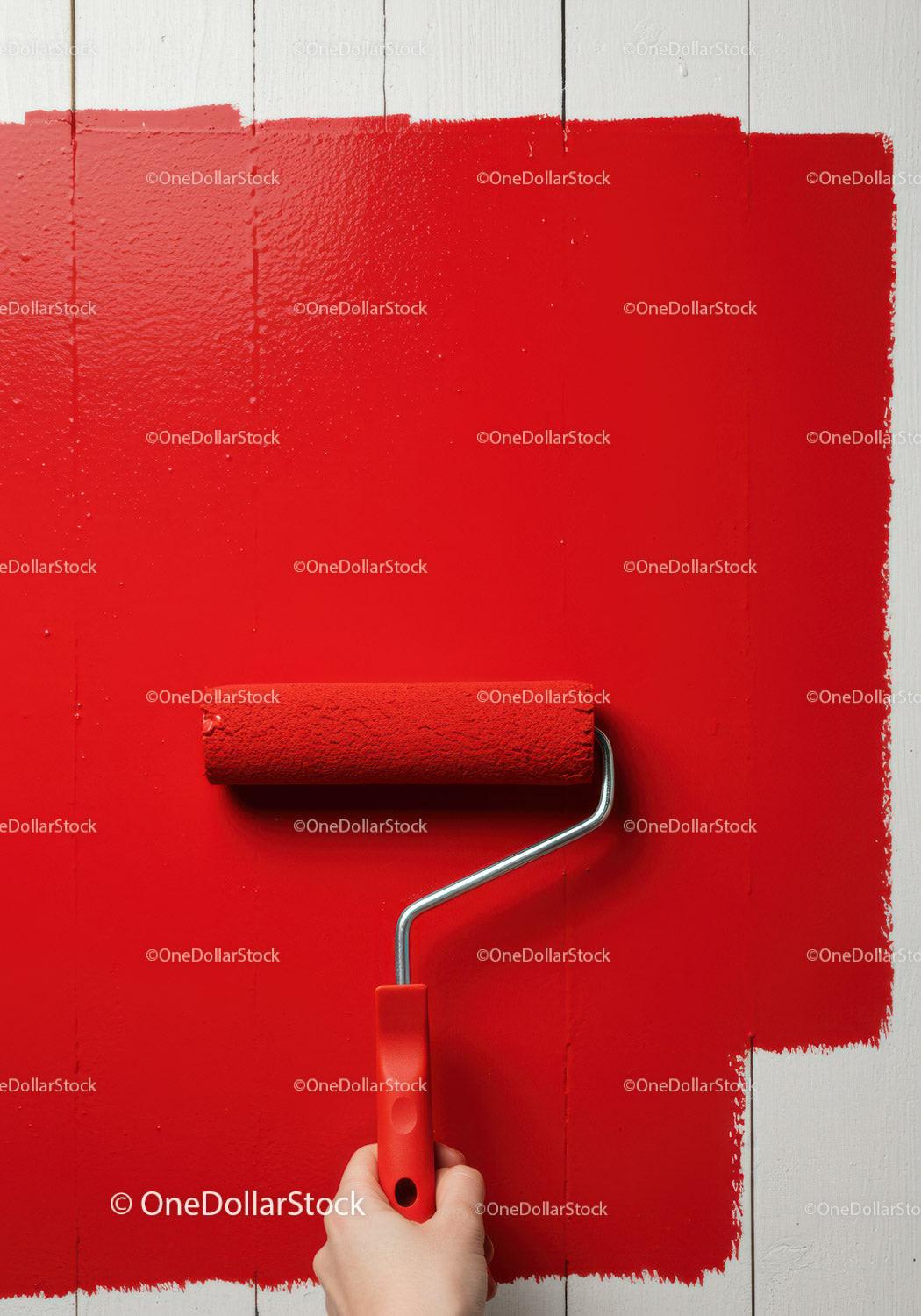 Red Wall Painting with Roller Tool for Home Decor