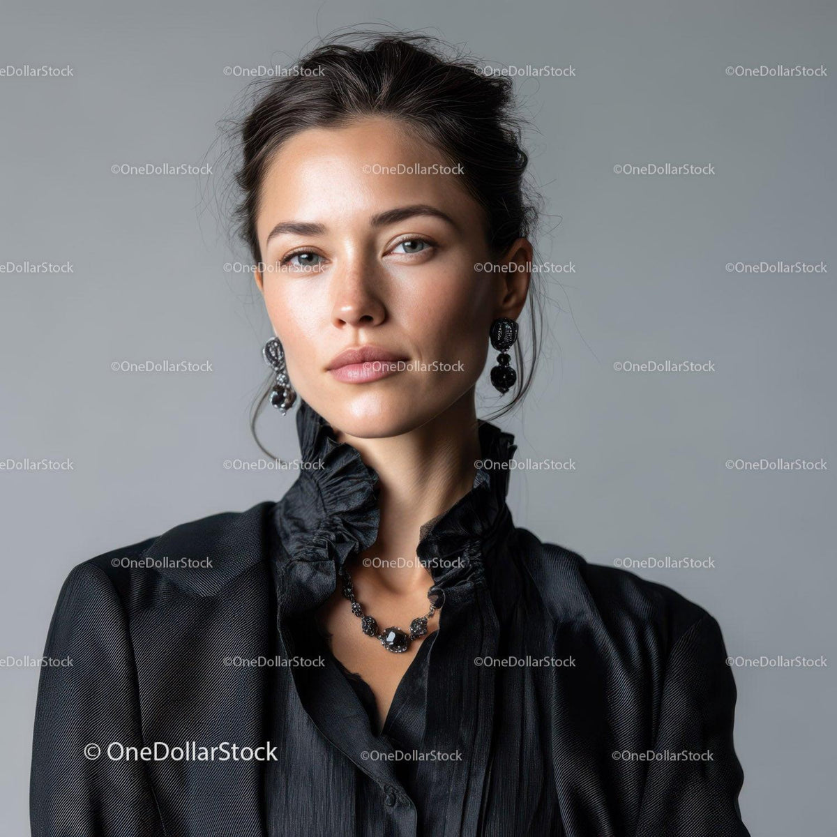 Elegant Woman with Black Dress and Jewelry on Gray Background