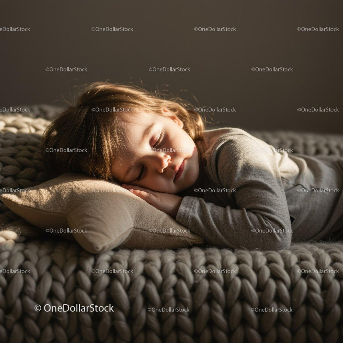 Peaceful child sleeping on cozy knitted blanket