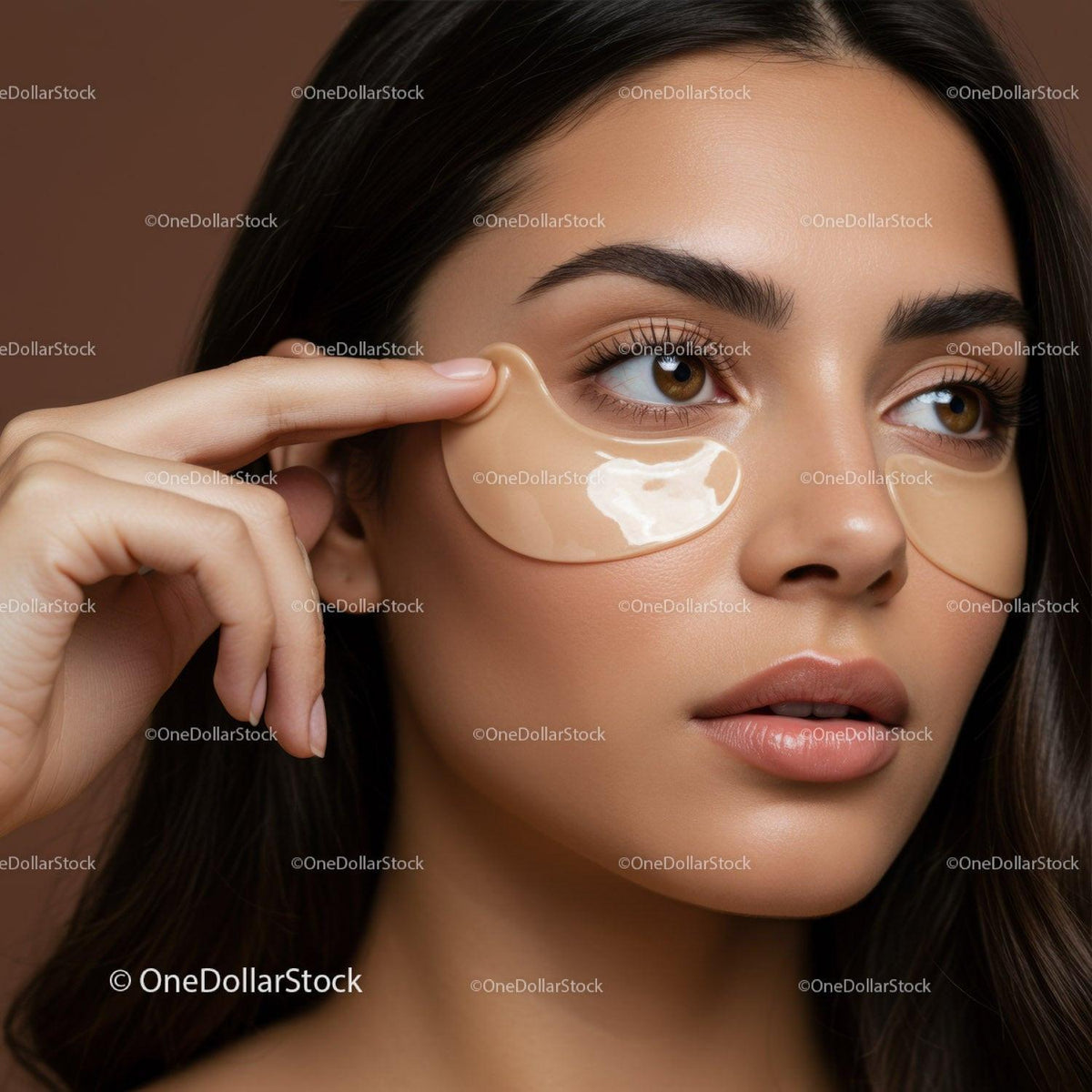 Young Woman Applying Under-Eye Gel Patches for Skin Rejuvenation