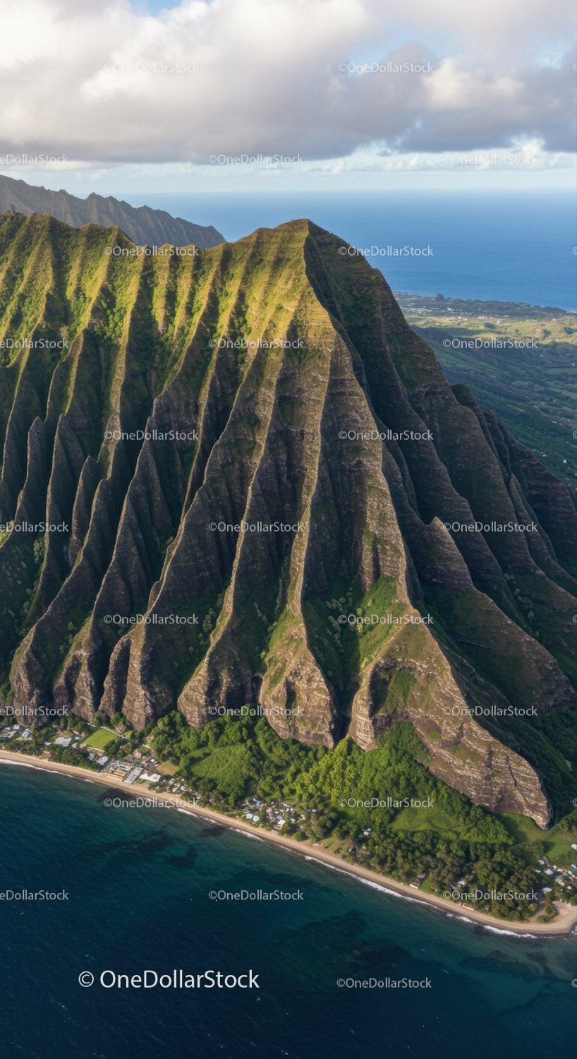 Scenic Mountain Range with Coastal View and Lush Greenery
