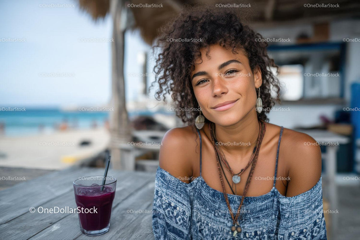 Smiling Woman with Curly Hair Enjoying Seaside Cafe Scene