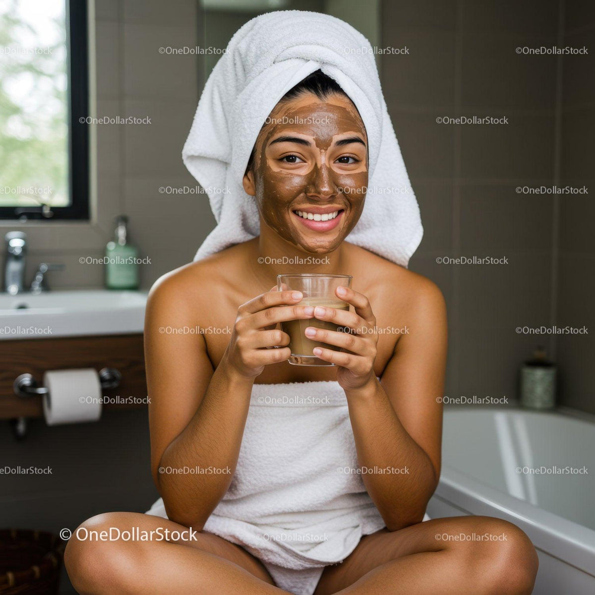 Young Woman Relaxing with Facial Mask in Cozy Bathroom