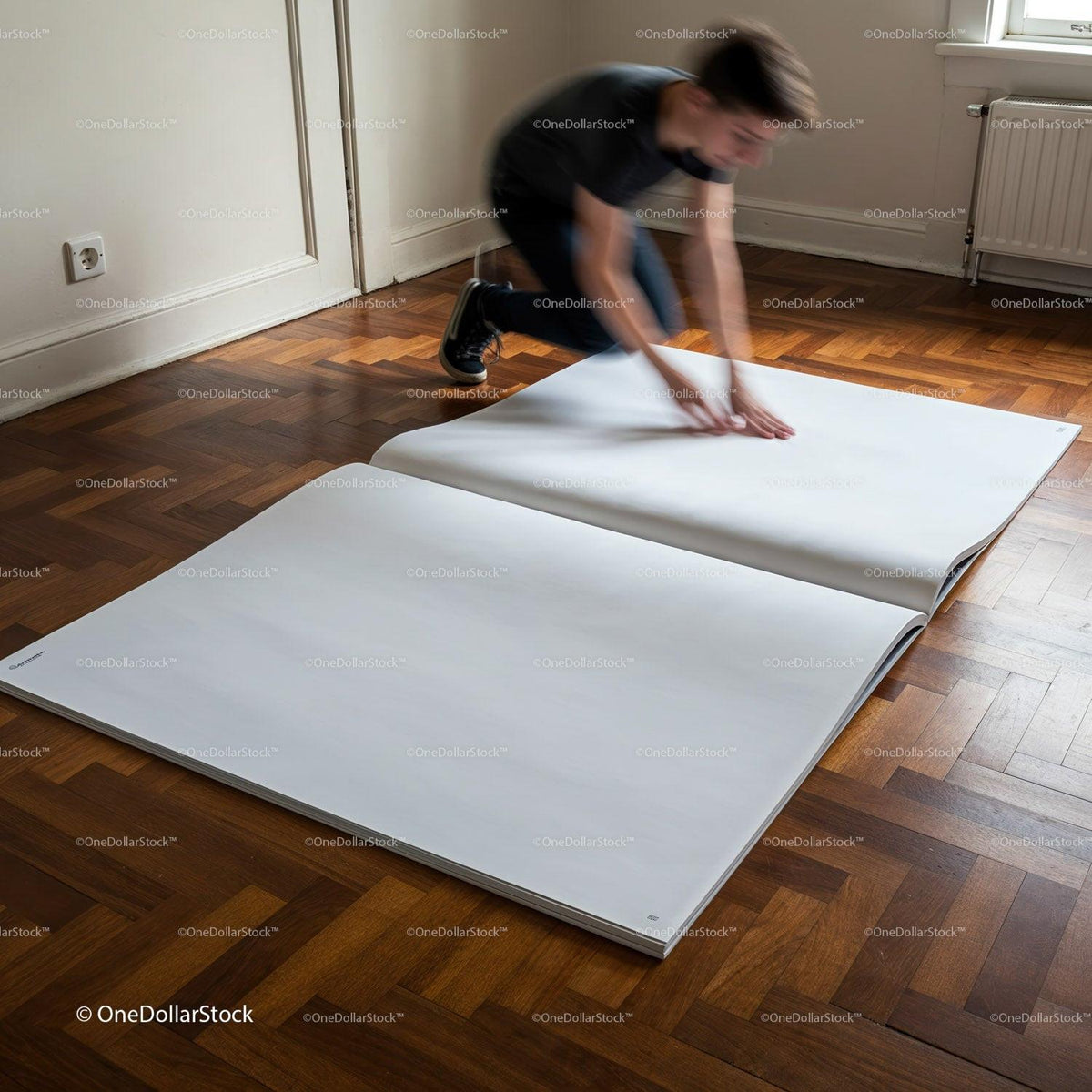 Person Unfolding Large Blank Paper on Wooden Floor JPG Mockup Image preview