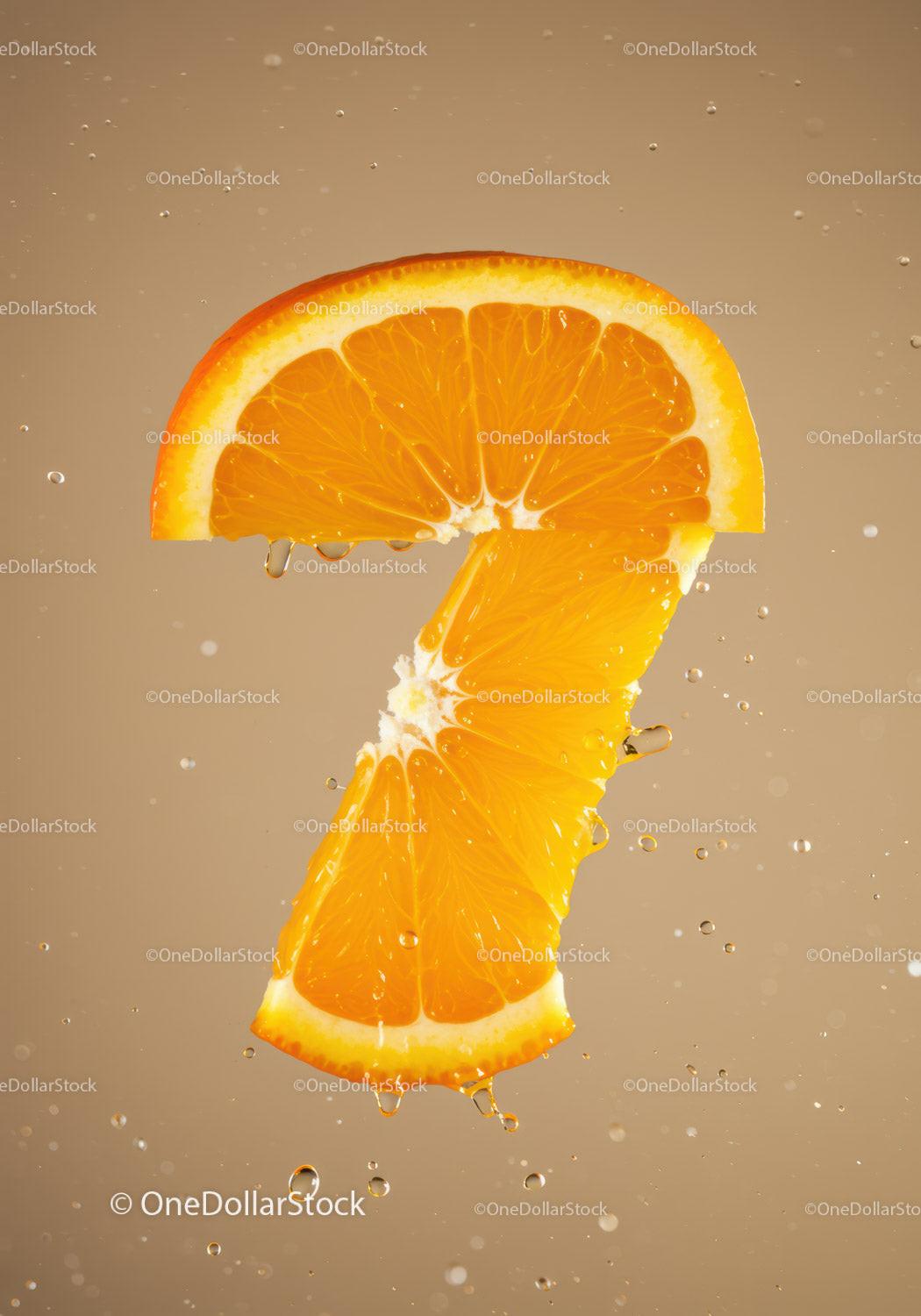 Fresh orange slice shaped like number seven in water