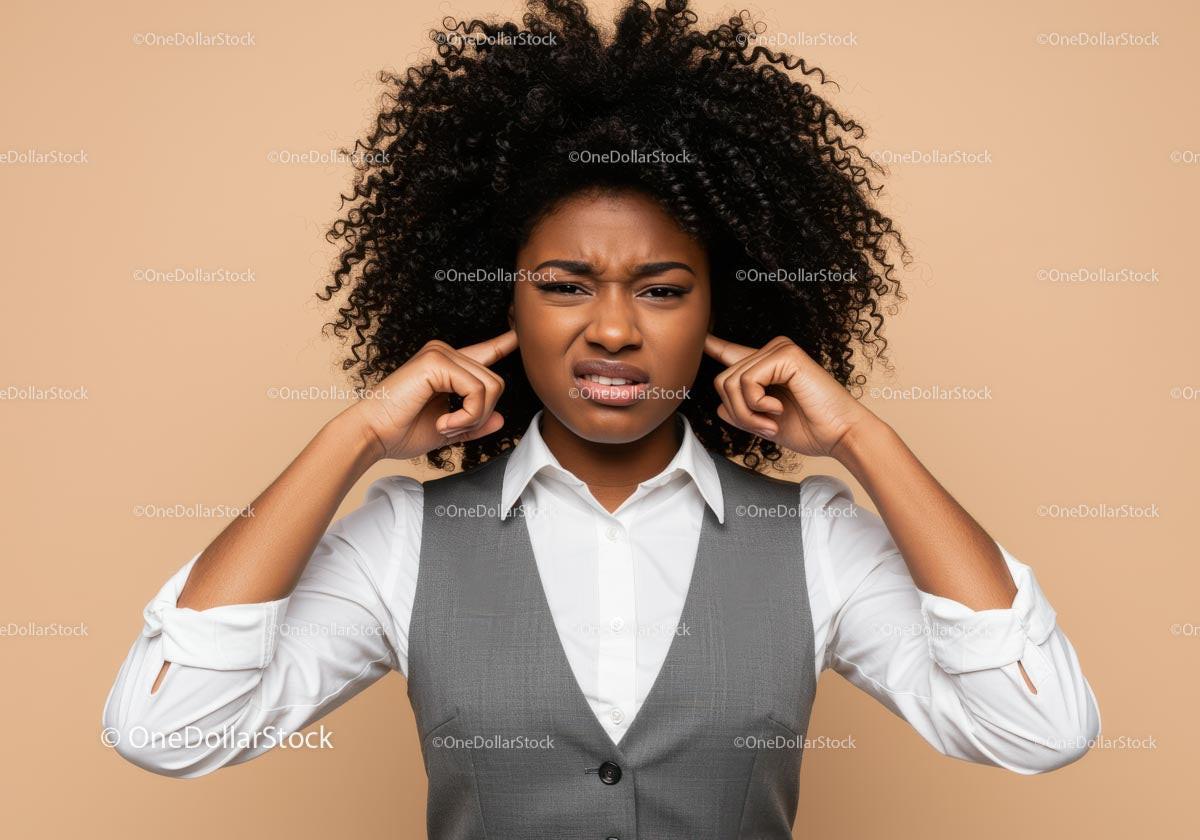 Frustrated Woman Covers Ears Against Noise in Business Attire Stock Photo Bundle preview 12
