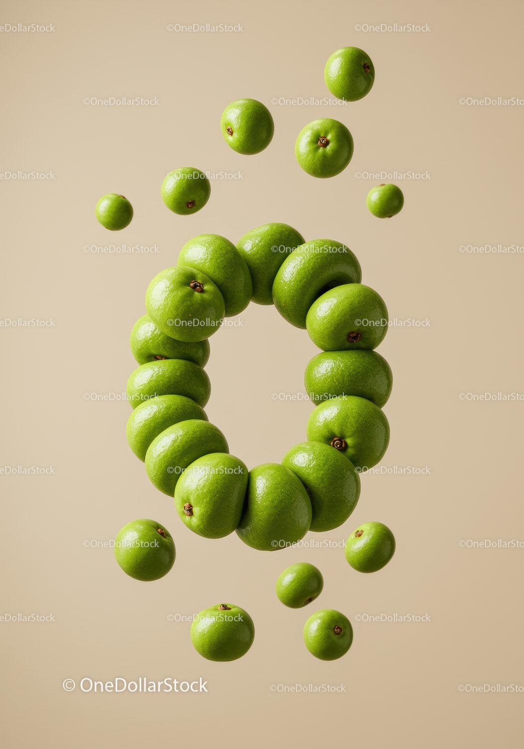 Fresh green apples arranged in circular floating pattern