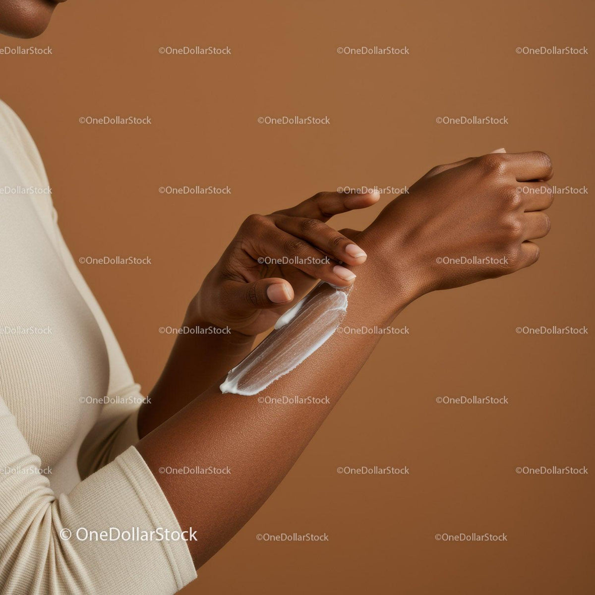 Close-Up of Woman Applying Sunscreen on Forearm for Skin Protection