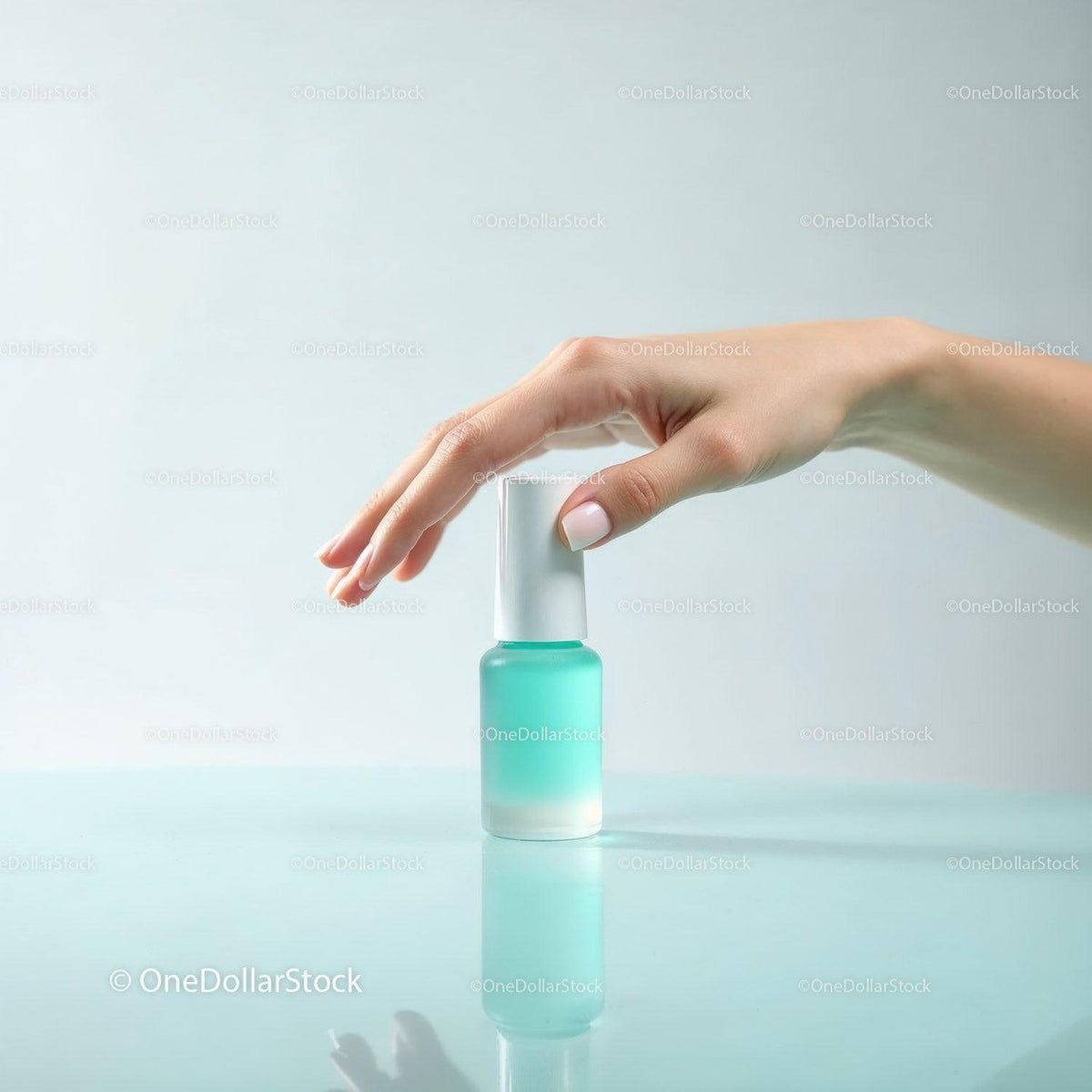 Elegant Hand Holding Turquoise Nail Polish Bottle in Minimalist Style JPG Mockup Image preview