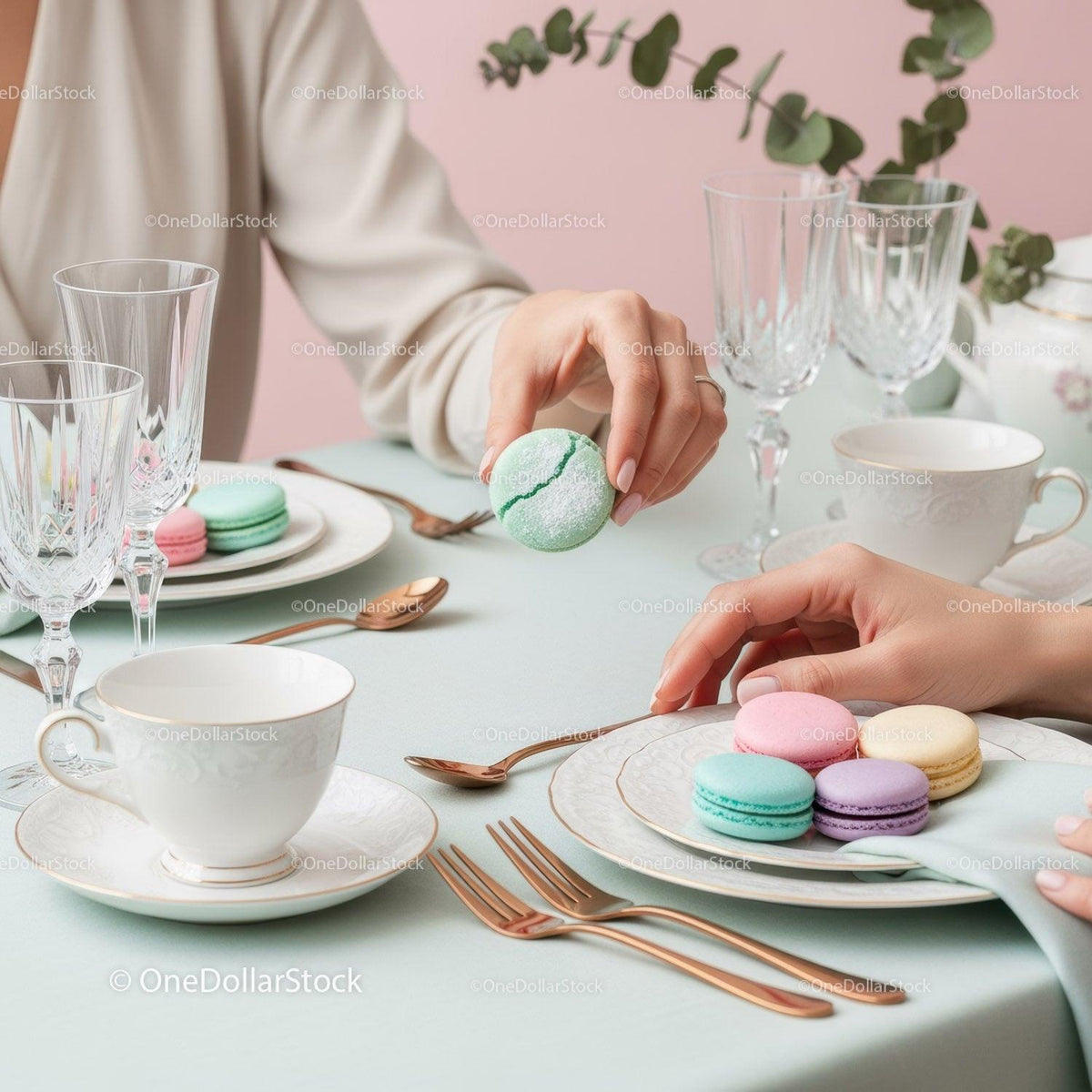 Elegant Table Setting with Pastel Macarons and Crystal Glassware