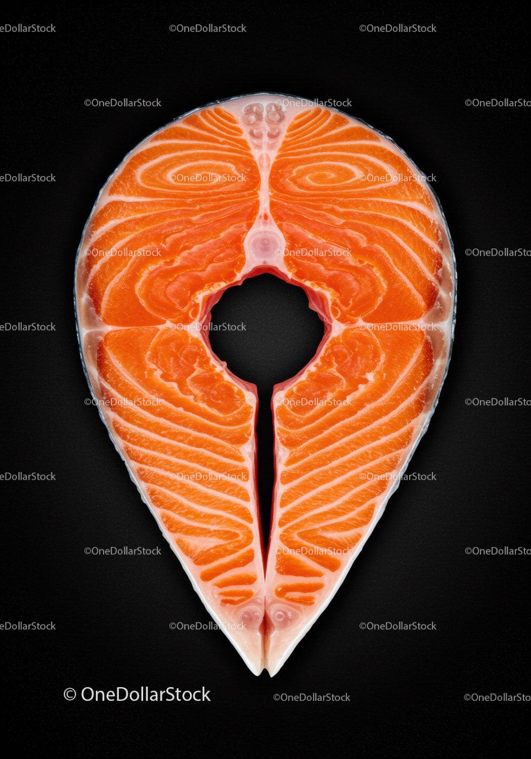 Fresh Salmon Steak Displayed on Black Surface