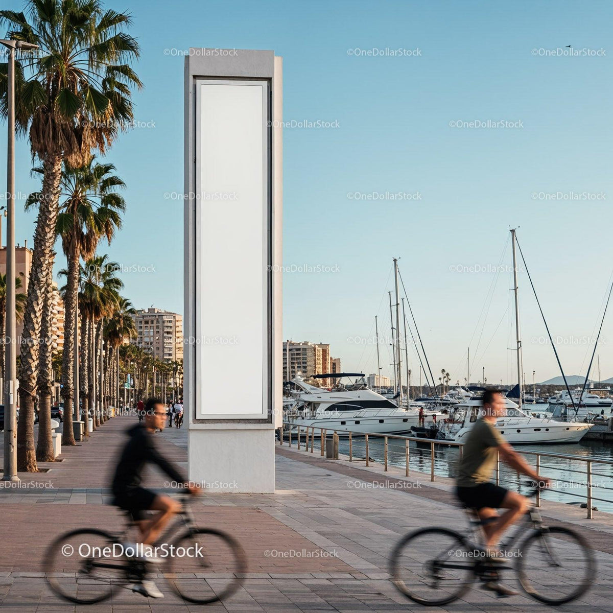 Cyclists riding along sunny coastal promenade with yachts JPG Mockup Image preview