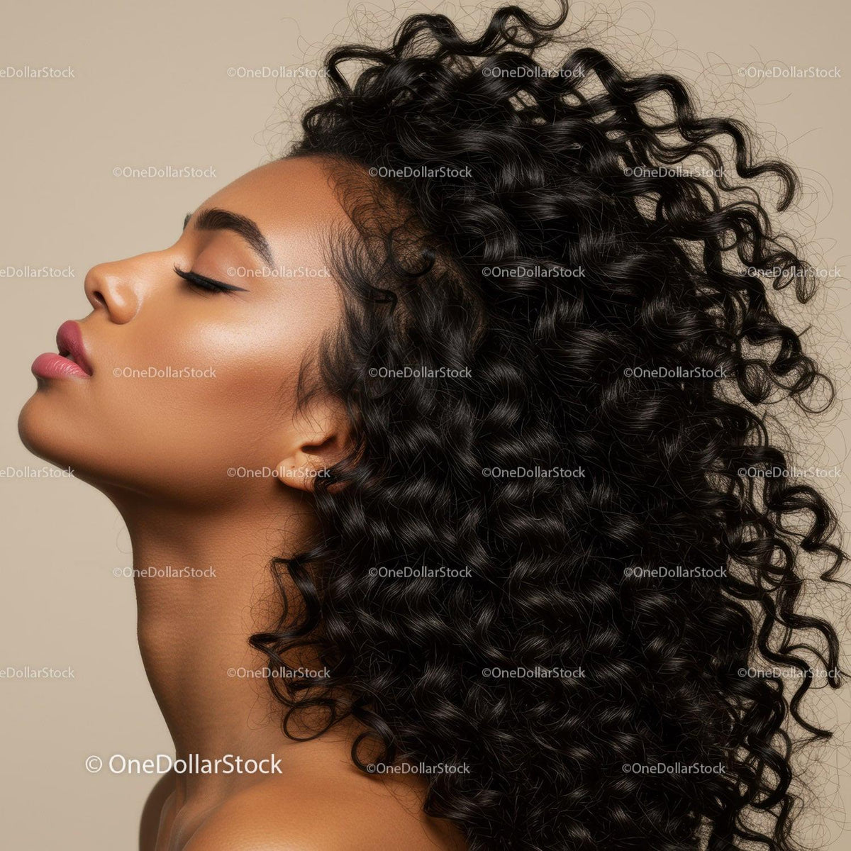 Close-up profile of woman with voluminous curly hair