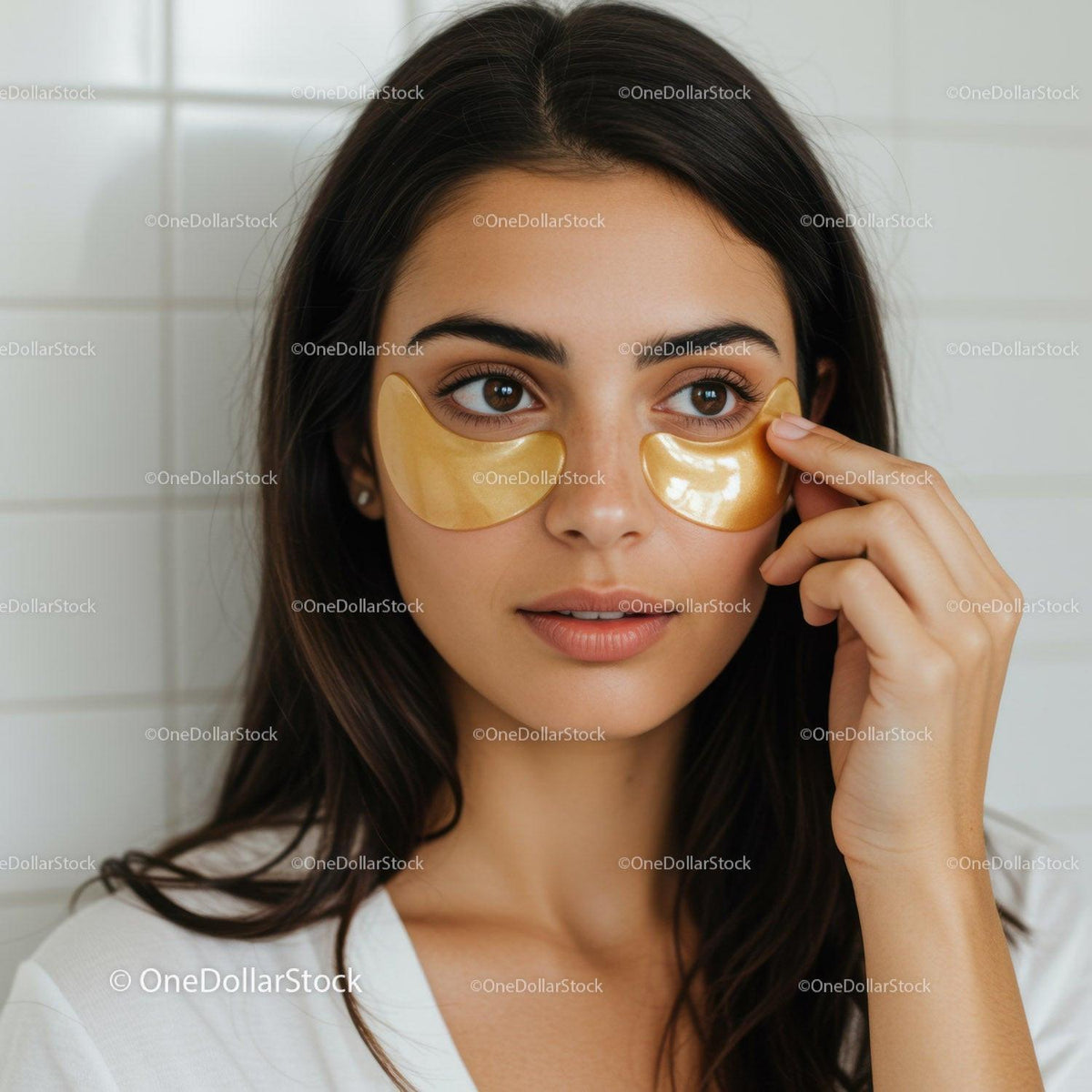 Young Woman Applying Under Eye Patches for Skincare Routine