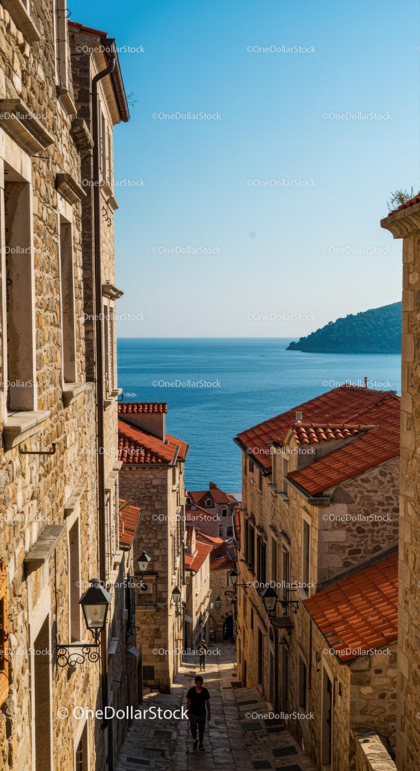 Charming Coastal Village with Red Tiled Roofs and Serene Ocean View