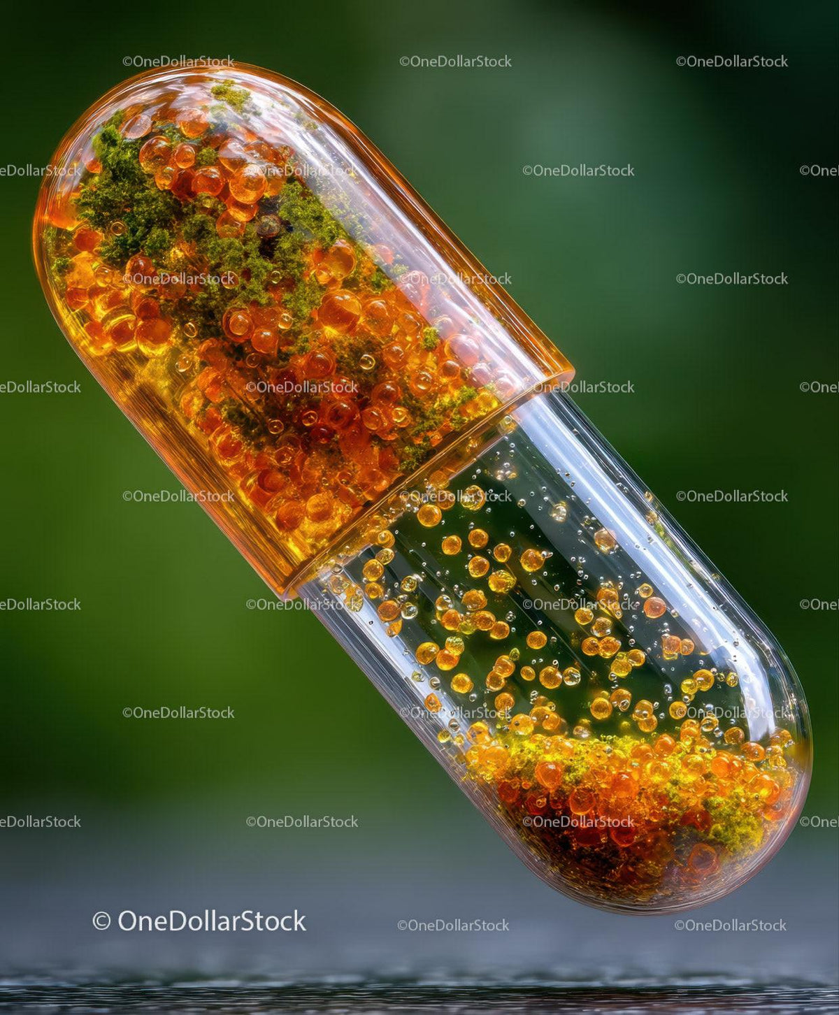 Transparent capsule holding orange beads and green moss with glossy surface