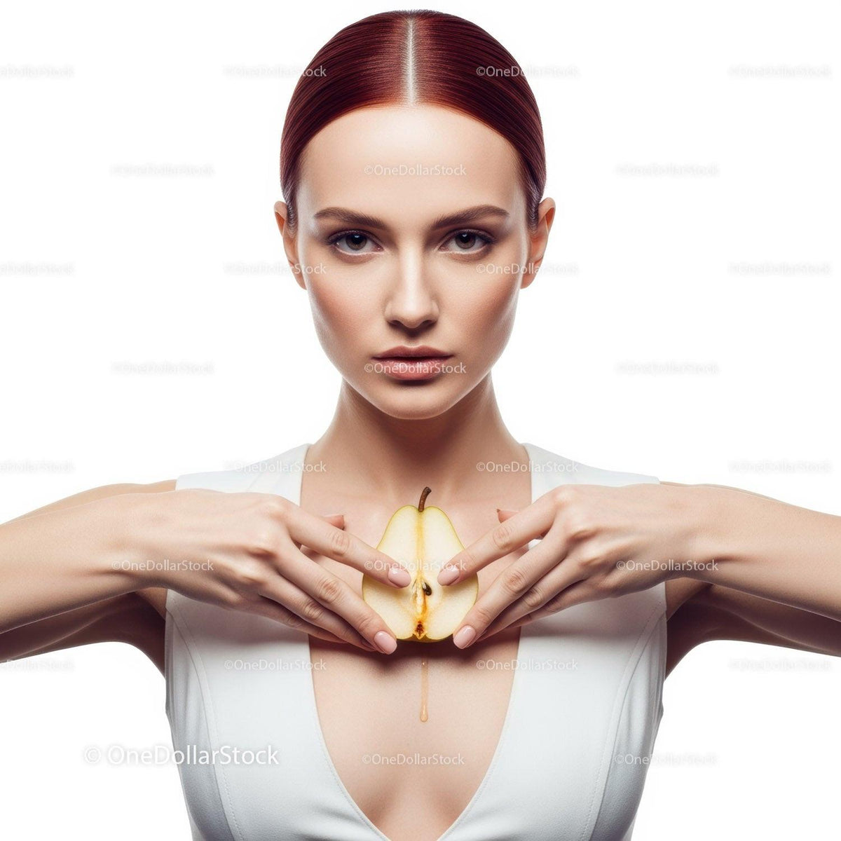 Elegant Woman with Red Hair Holding Pear in Studio Portrait