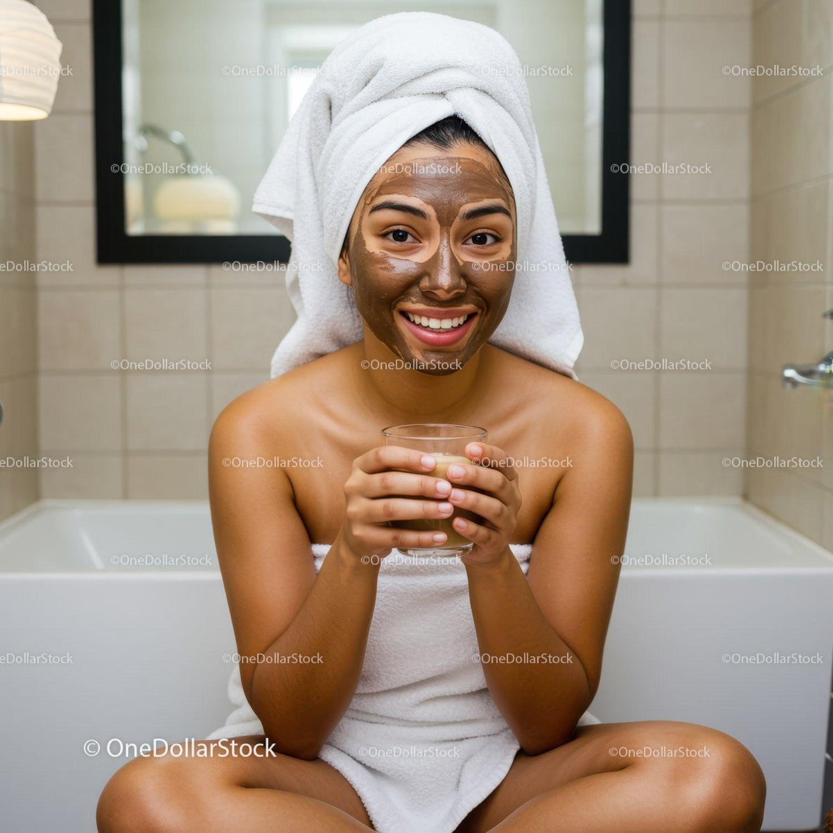 Young Woman with Clay Face Mask Relaxing in Bathroom Spa