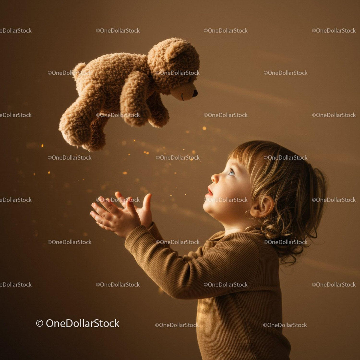 Toddler Reaching for Floating Teddy Bear with Wonder