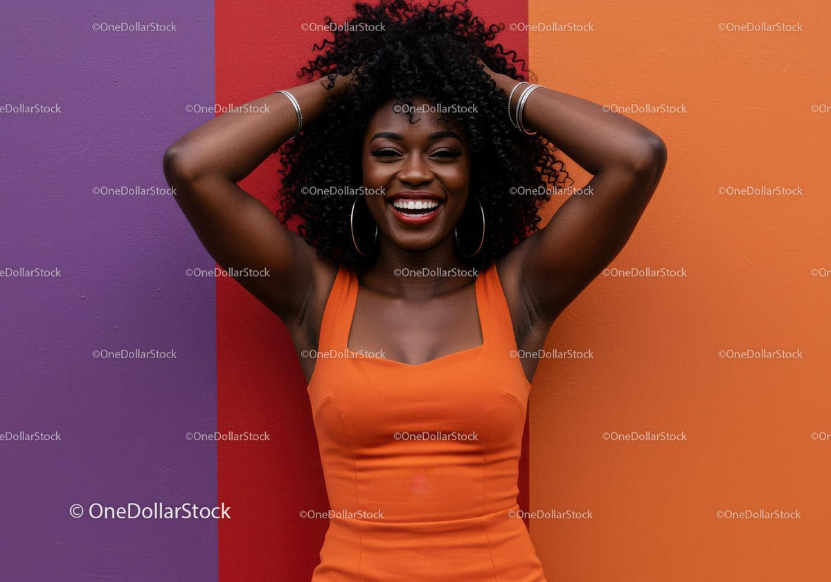 Vibrant Young Woman in Orange Dress Celebrating Joy