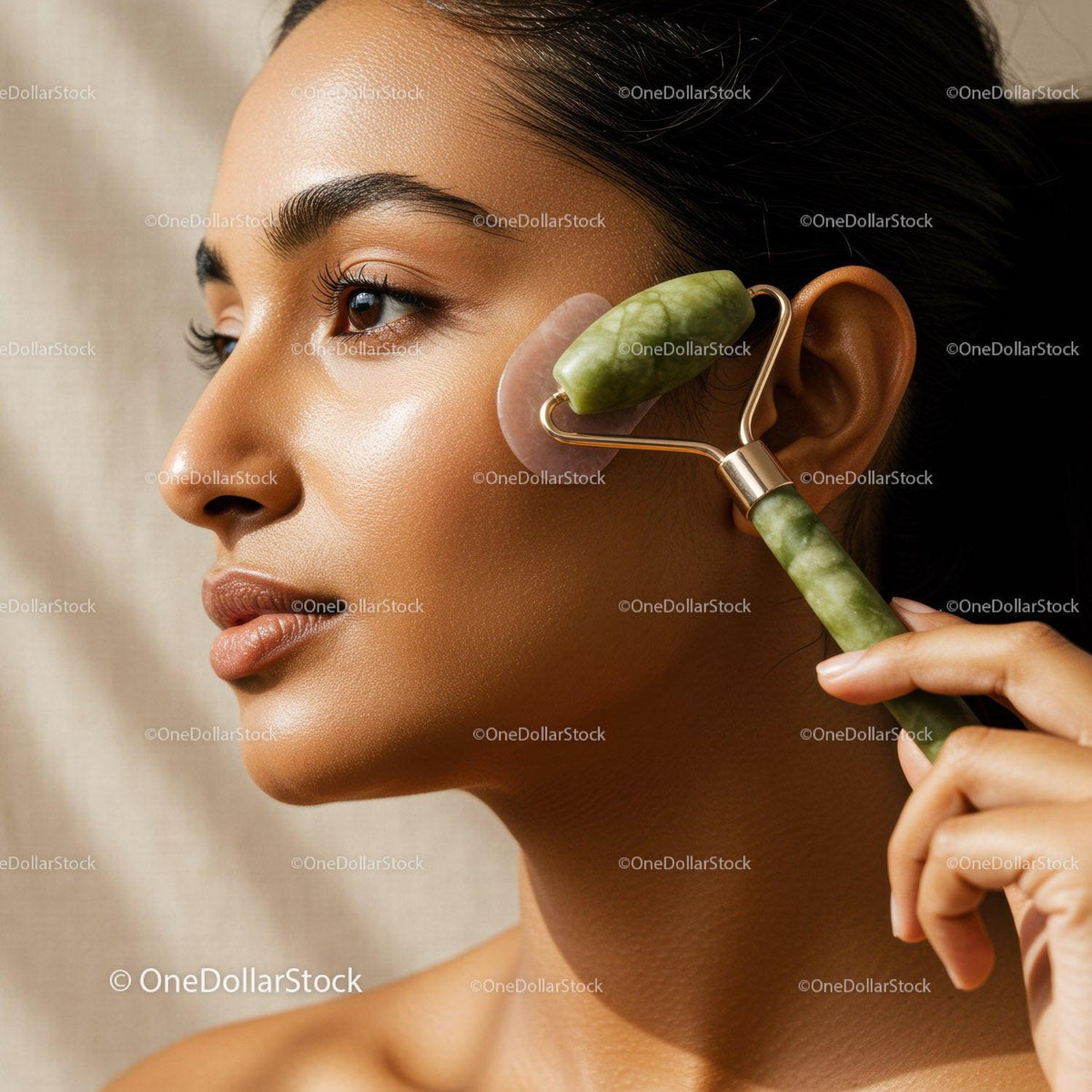 Woman Using Jade Roller for Facial Massage and Skin Rejuvenation